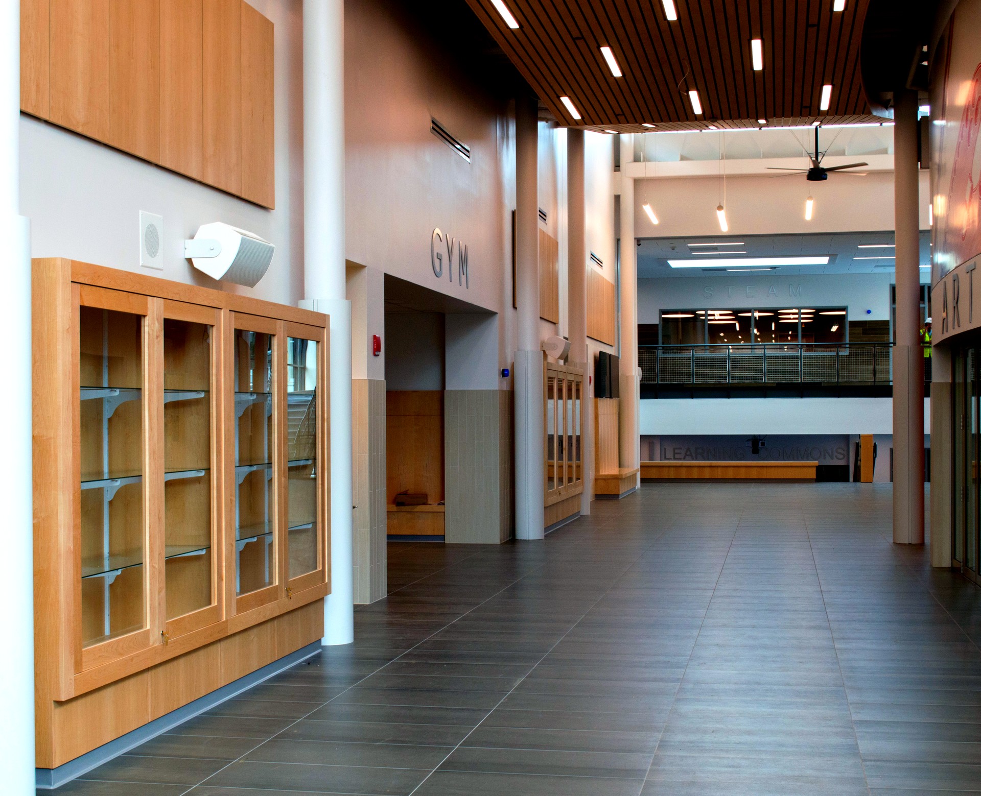 Healthcare reception and intake millwork with seamless surfaces