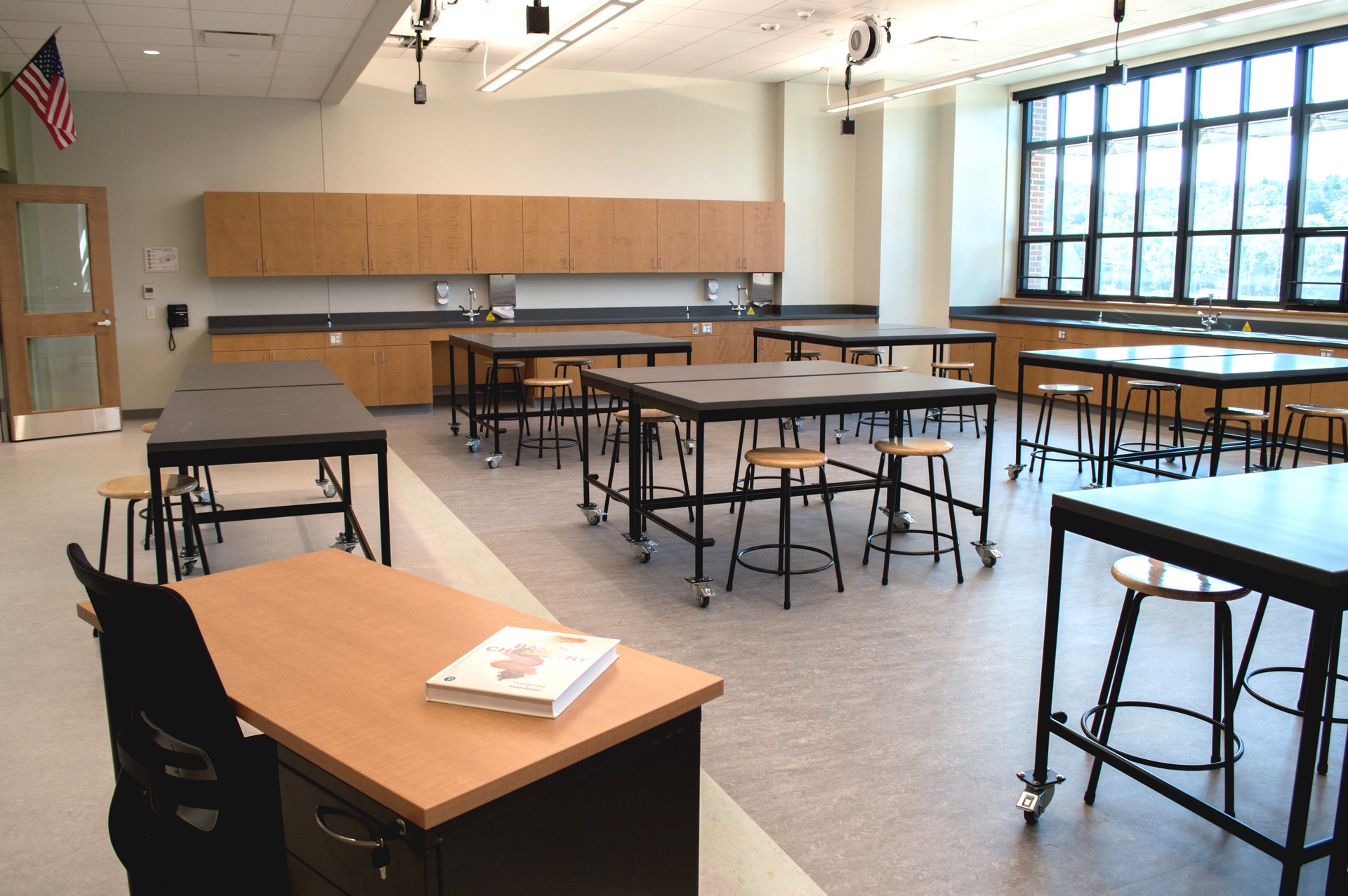 Integrated corporate millwork with concealed services and precision panel alignment